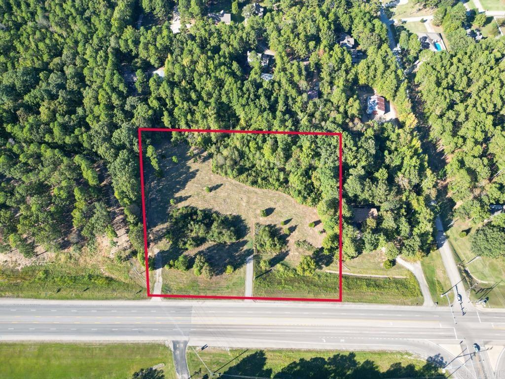 Looking for land? Here is a great opportunity to purchase property right by Crowleys Ridge College and the 412w bypass. This land is just inside the city limits of Paragould and zoned residential. If you are looking to build this would be a great choice, there are two driveways off the hwy as well.