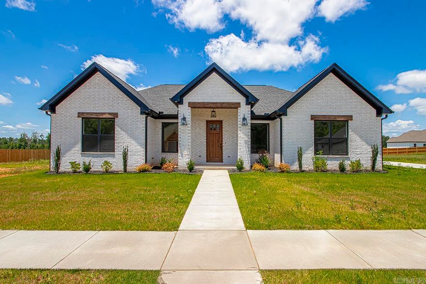 Get ready to be amazed by this incredible home! With an open concept living space, you'll love the large island perfect for entertaining. The kitchen is equipped with a gas stove top, wall oven, and microwave. Curl up by the cozy gas fireplace in the living room. The massive pantry will be your dream come true! The laundry room has a convenient locker/mud area and ample space. This split bedroom plan includes two bedrooms on one side, with a hall bath and a third bedroom at the front of the house with quick access to the half bath. The primary bedroom retreat awaits you with a spa-like bathroom featuring a large tile shower and standalone tub. The double vanities and plentiful cabinet space are the icing on the cake. Enjoy the quiet neighborhood, sidewalks, and a great area for kids to play. Don't miss out on this fantastic home! VERY MOTIVATED SELLER!! MAKE AN OFFER! Builder is OFFERING a BUY DOWN with acceptable offer.