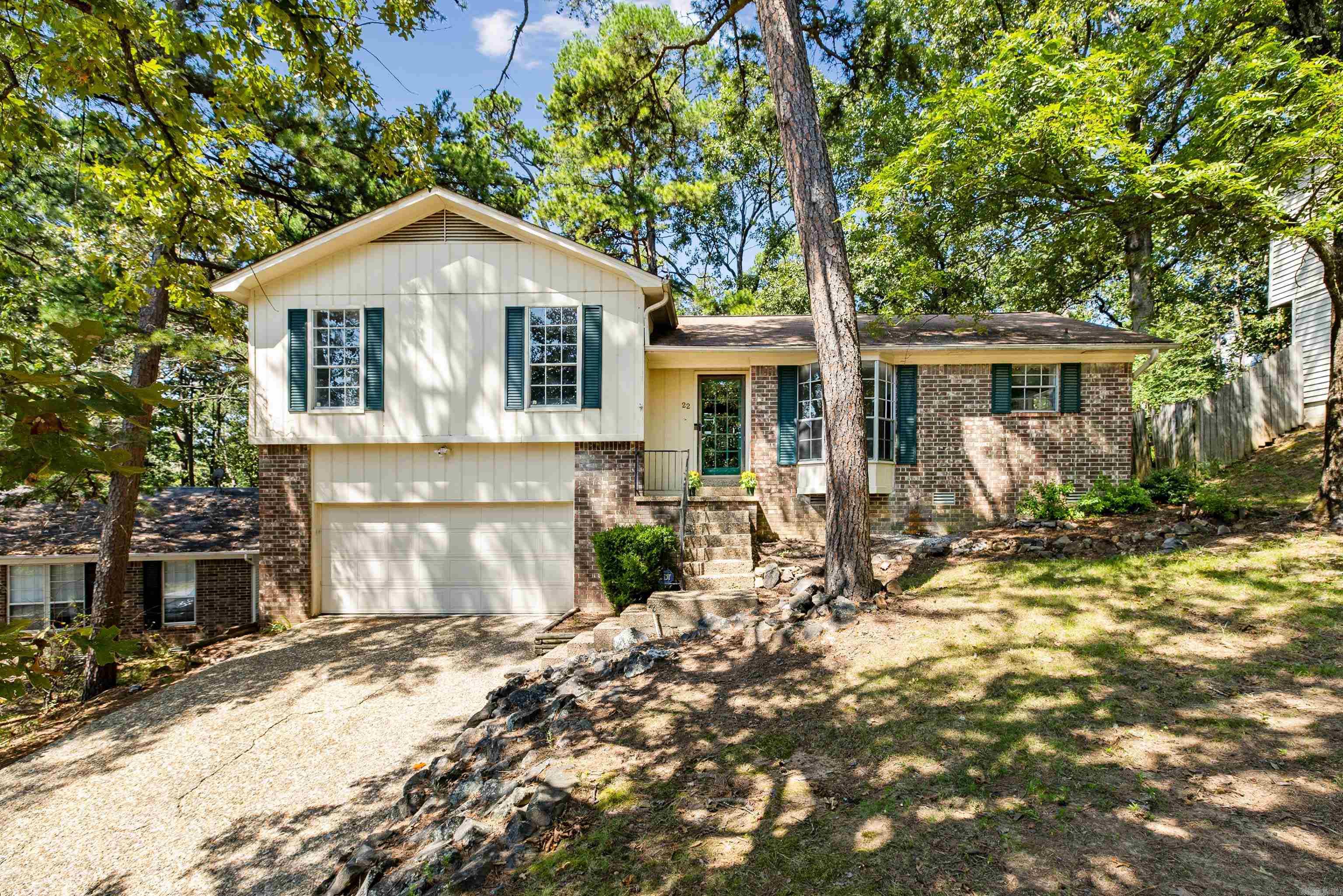 What a great find in this area of Little Rock! Affordable le 3 bedroom, 2 full bathroom home with a brand new water heater, brand new stainless steel refrigerator, which conveys with the house, brand new stainless steel electric stove and brand new stainless steel vent hood. Also just replaced is the beautiful glass patio door. This house comes with a stackable washer and dryer in place as well. In the large living room is a woodburning fireplace with a gas starter and a spot for a desk and laptop making it so easy to work from home. Enjoy the newly remodeled primary bathroom with tile shower, new vanity with sink and a new toilet. It’ move-in ready and you can be moved in just in time for the Holidays! Don’t miss out on this one…it’s ready to go!
