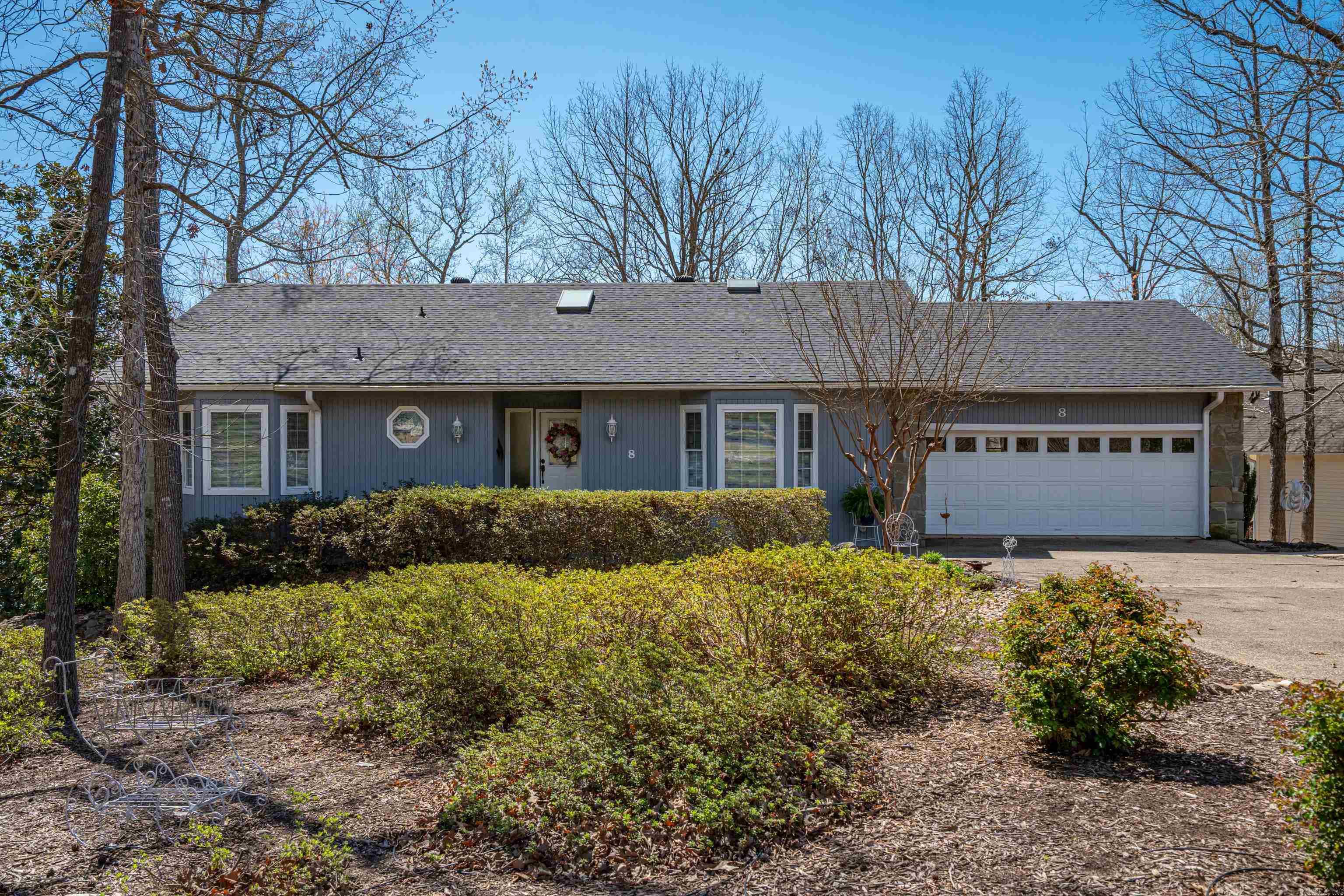 Discover the perfect lakeside retreat on beautiful Lake Balboa! This spacious family home has 3 bedrooms and 3 baths that offers 2,882 sq. feet of heated and cooled space, featuring modern updates throughout. Inside you'll find tile flooring throughout, a cozy fireplace and a bright and airy Arkansas Room that provides a great view. Vaulted ceilings enhance the flow of the natural lighting. The lower level boasts a large family room and an additional bedroom and full bath, and the view gets even better with all glass doors leading to a walkout patio- perfect for relaxing with family. A covered boat dock with lift is included. Non-property owners will be subject to a $2000 onetime initiation fee to property owner's assoc. at closing. This lovely home is being offered for $675,000. I promise you won't be disappointed. Don't miss the opportunity to own a move in ready lakefront gem!