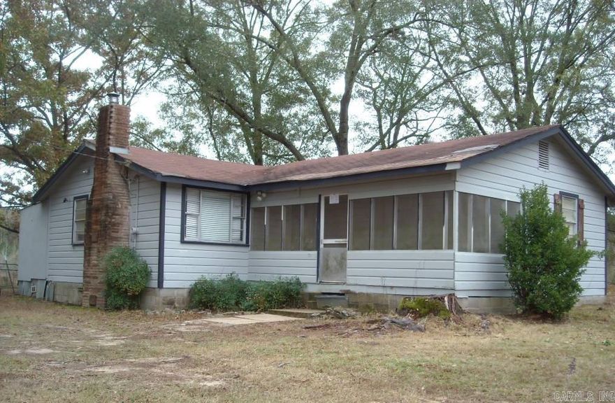 GIVE US A CALL FOR A SHOWING OF THIS COUNTRY HOME LOCATED JUST OUT OF TOWN IN STRONG ARKANSAS  - All offers must be submitted via Propoffers.com