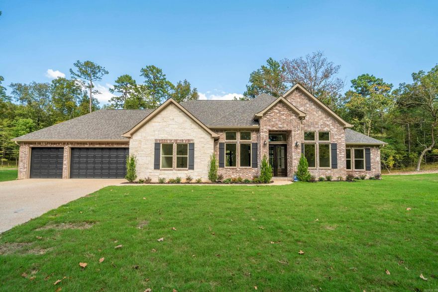 New Construction in Highly Desired 7 South location. Stunning Home with the features you are looking for. Special Wall Moulding addcharm to this open floorplan that welcomes your family and guests. Enjoy cozy holidays around the fireplace. Large granite island in thechef’s kitchen, double ovens and custom cabinets. The primary bedroom features walk in closet and ensuite with luxurious finishes.Stairs to attic for storage. Deeded lake access. Lake Views , across the street from Lake Hamilton. Estimated completion Fall of 2025.