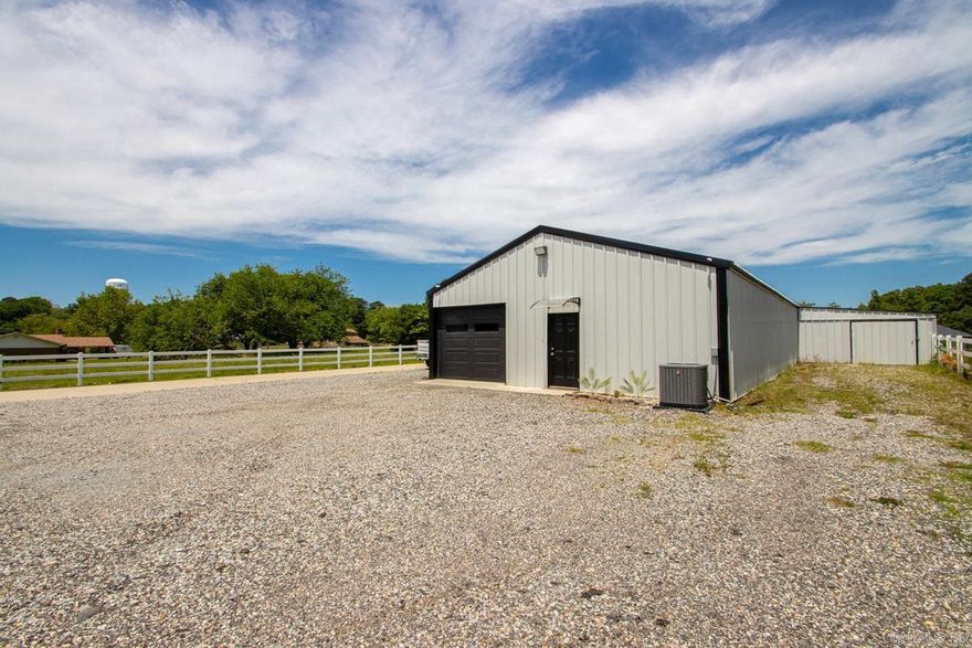 Discover a premier workspace designed for versatility and security. This impressive facility offers 3000+ SF of interior space complemented by a 900 SF side shed for additional storage. Situated on nearly 3/4 of an acre, the property is fully gated and features 10x10 doors, making it ideal for a growing business or a private workshop.   The Layout includes a beautiful office space, full bathroom and dedicated areas that can be closed off for privacy or multi-use purposes. A 30x60 addition was recently completed in 2024. Whether you need a high-end hobby shop or a professional business hub, this property is in a great location and turnkey!!