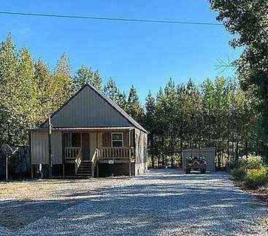 Located in the Hurricane Bottom, nice for fishing and hunting.