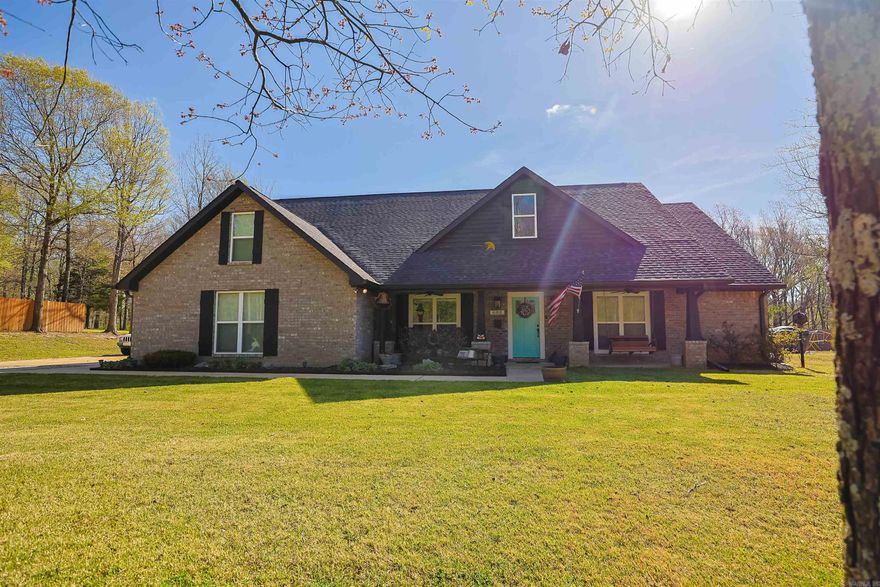 This country custom home has everything you need AND everything you want! On the main floor, walk into an entry way open to a large living room. The kitchen is impressive with abundant cabinetry and Frigidaire Professional appliances, including a 36 dual fuel range and side by side column refrigerator/freezer combo. The walk in pantry allows for extra storage and keeping the kitchen magazine worthy! Also on the main floor is the primary suite, an office, full size laundry with sink and built ins, and a full guest bathroom. The additional two bedrooms, a bathroom, and another office/bonus area are upstairs. There is potential for 5 bedrooms if needed, with minor modifications. Cozy up on a cool night in front of the gas log fireplace in the screened back porch. Enjoy a morning swim in the exercise pool. Play a game of backyard baseball in the space of the 1 acre lot. 688 County Road 461 in Jonesboro, Arkansas is located in Valley View school district and is ready to become your dream home!