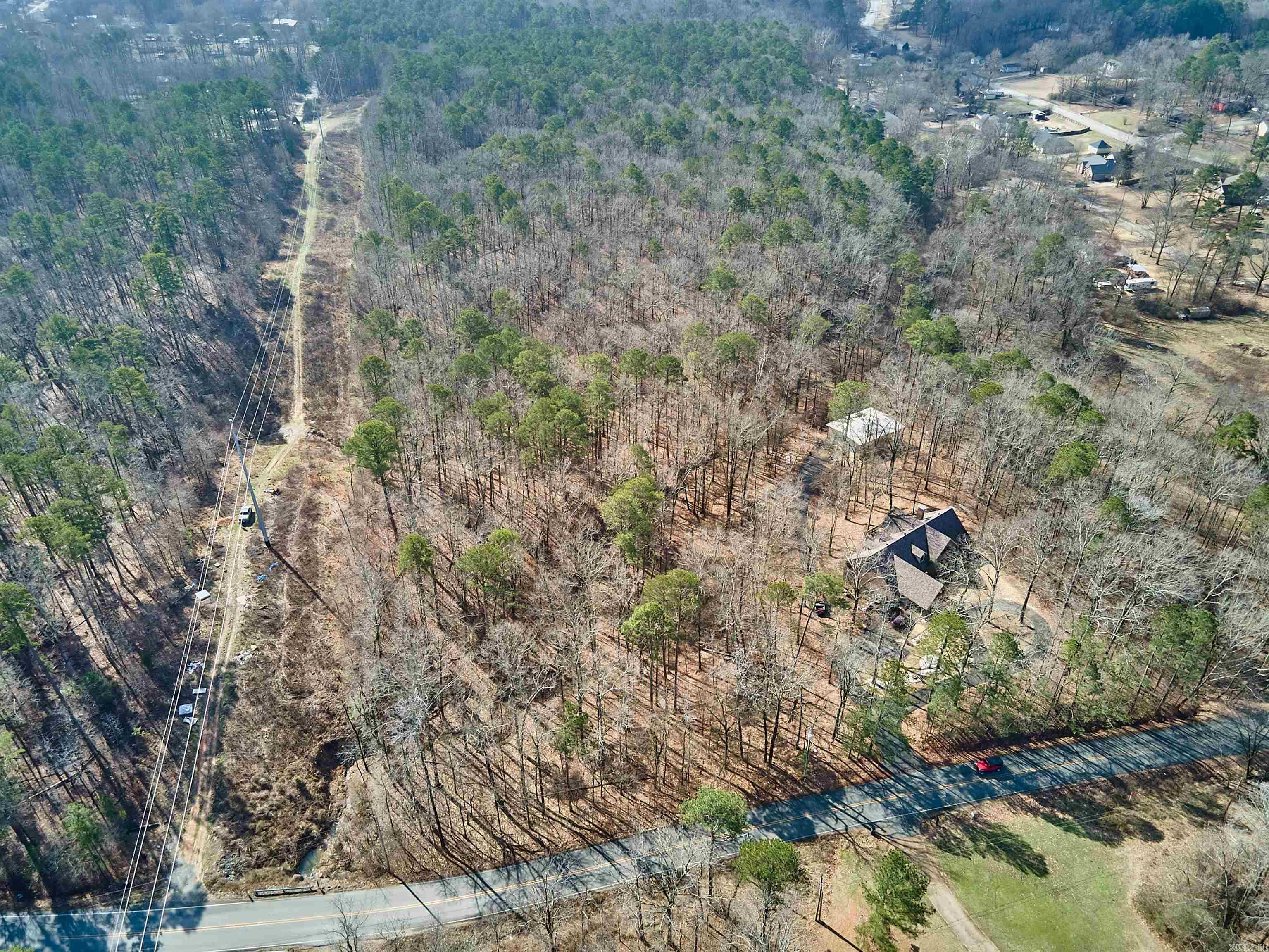 Beautiful land to develop into a wonderful subdivision. Rolling hills, beautiful creek runs through the property. Land is broken into separate parcels property could make a beautiful oasis for your home. Located close to town!!!