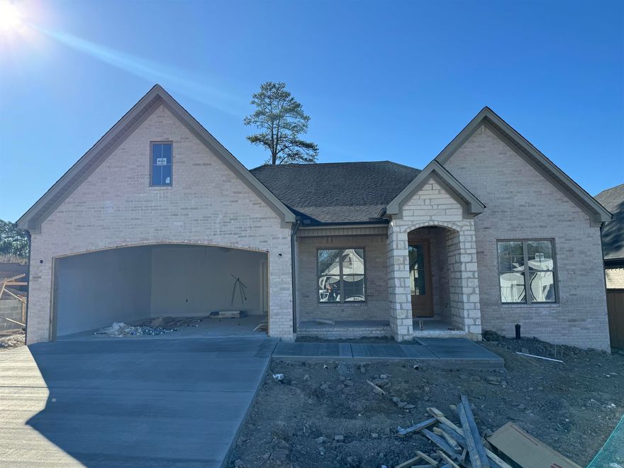 This beautiful new build in Parkside at Wildwood is surrounded by greenery, and you'll never have to mow again with lawn care included! This community offers a secluded feel but is just seconds from all that West Little Rock has to offer with close proximity to your favorite shopping & dining options. This thoughtful plan offers 4 full bedrooms, large laundry room and 2 bathrooms. The expansive primary bedroom connects to its own luxurious, spa-like bathroom equipped with a soaking tub, separate walk-in shower, and a custom walk in closet. This single level home is designer curated and scheduled to be completed in Spring 2024. Get in now too choose some finishes!