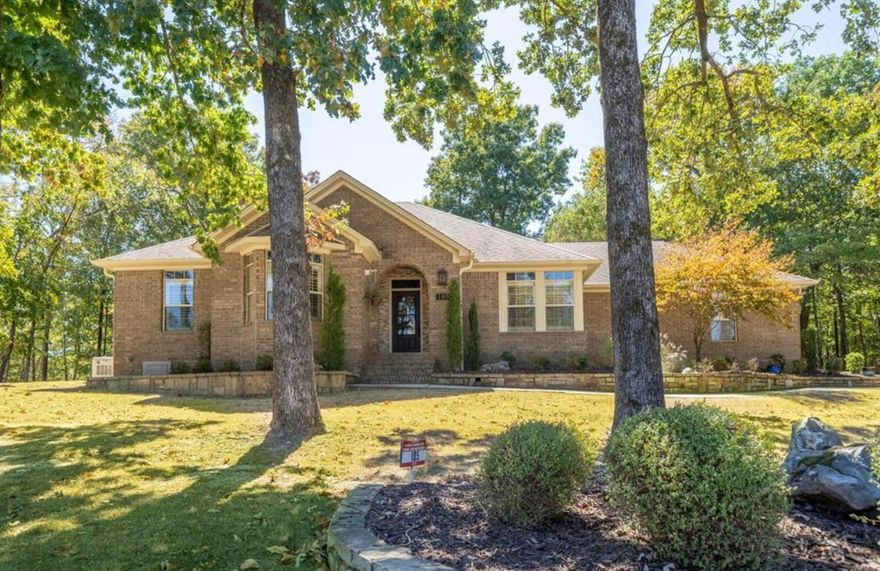 Upon entering this 3/2 brick home, you'll be greeted by an inviting open floor plan that seamlessly connects the living room and kitchen, providing an ideal space for entertaining friends and family. The separate dining room is just off the kitchen and this room provides beautiful lake views through the interior boxed shutters. The open access kitchen comes equipped with modern appliances, ample cabinet storage, and a convenient breakfast bar. It's a chef's dream come true, perfect for preparing delicious meals and hosting memorable gatherings. The three bedrooms are spacious and offer comfortable living quarters for the entire family. The large master bedroom features an en-suite bathroom with a grand Jacuzzi tub and separate shower, ensuring privacy and convenience. The remaining bedrooms share a well-maintained bathroom with updated fixtures. One of the standout features of this property is the spacious sunroom, which provides an ideal place to relax, watch a game or movie or just sit back and relax. House includes an all-home Cummins generator.