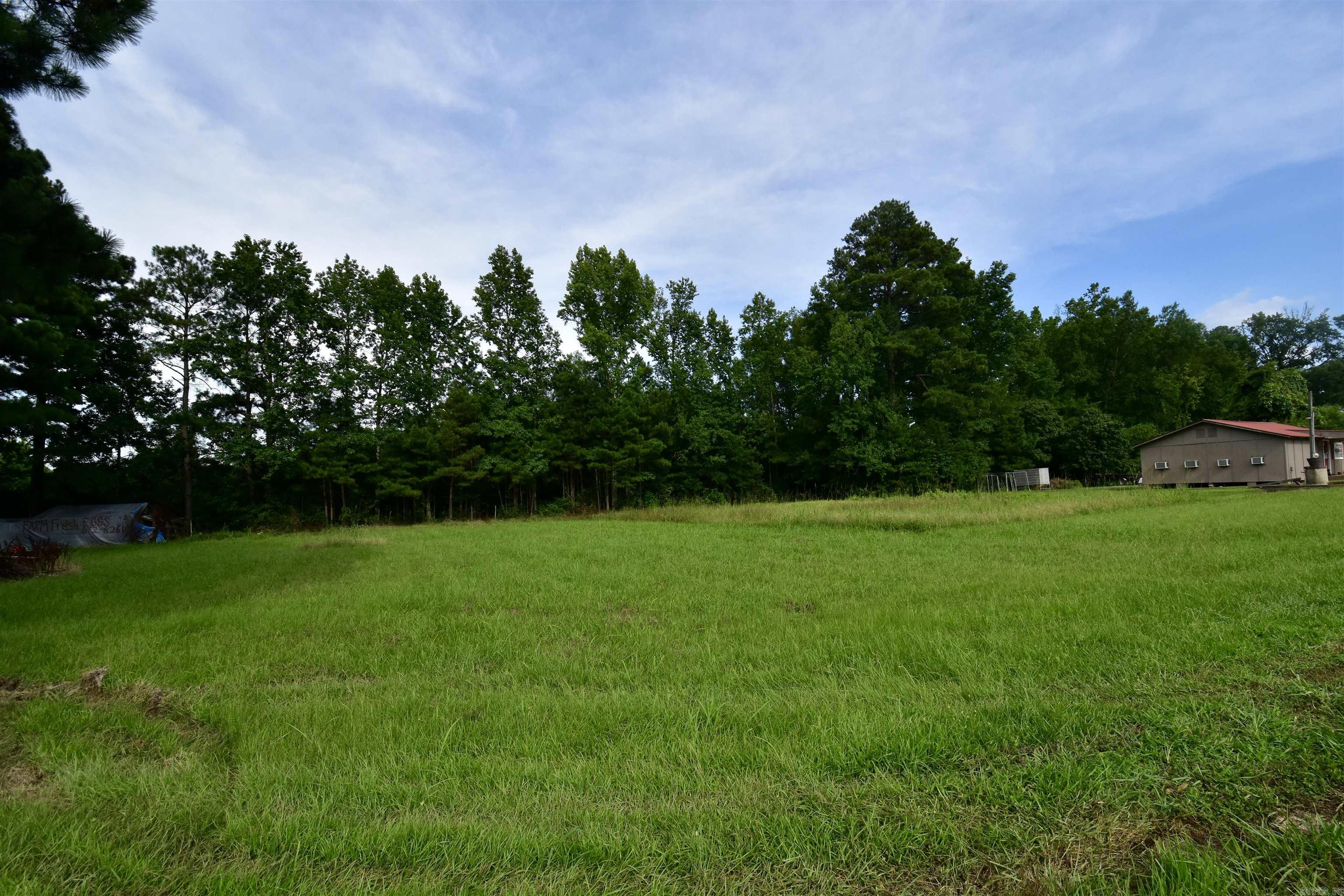 Incredible opportunity to own 1.25 cleared and level acres on Highway 67, directly across from Glen Rose School. This high-visibility location is ideal for commercial development or investment. Utilities are already on site, making it ready for your next project. A trailer currently on the property will be removed prior to closing. With easy access and strong daily traffic, this is a strategic spot for a business or long-term investment.