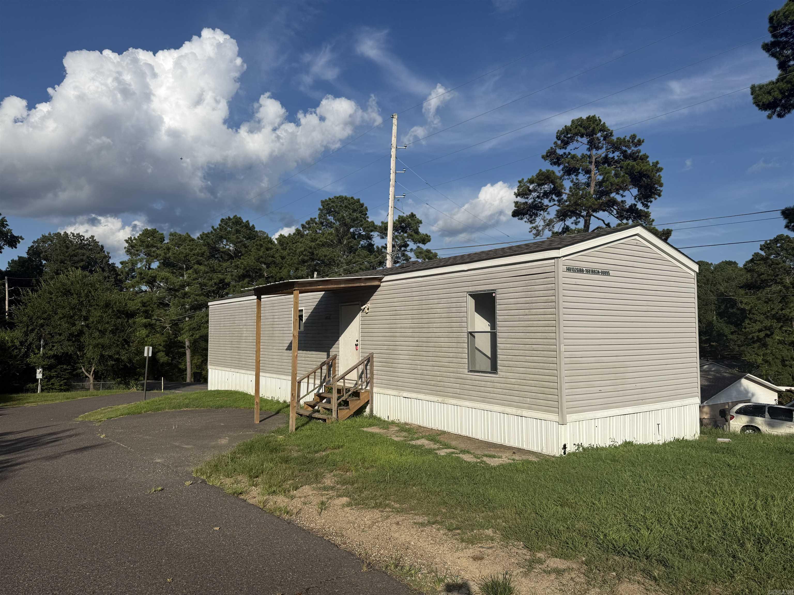 Welcome to our spacious 3-bedroom, 2-bathroom apartment located in the beautiful city of Hot Springs, AR. This manufactured home boasts a modern design with no carpet, making cleaning a breeze. Situated in a peaceful mobile home park, residents can enjoy a serene environment while still being close to all the amenities the city has to offer. With plenty of space for relaxation and entertaining, this apartment is perfect for those looking for a comfortable and convenient living space. Don't miss out on the opportunity to make this apartment your new home sweet home.
