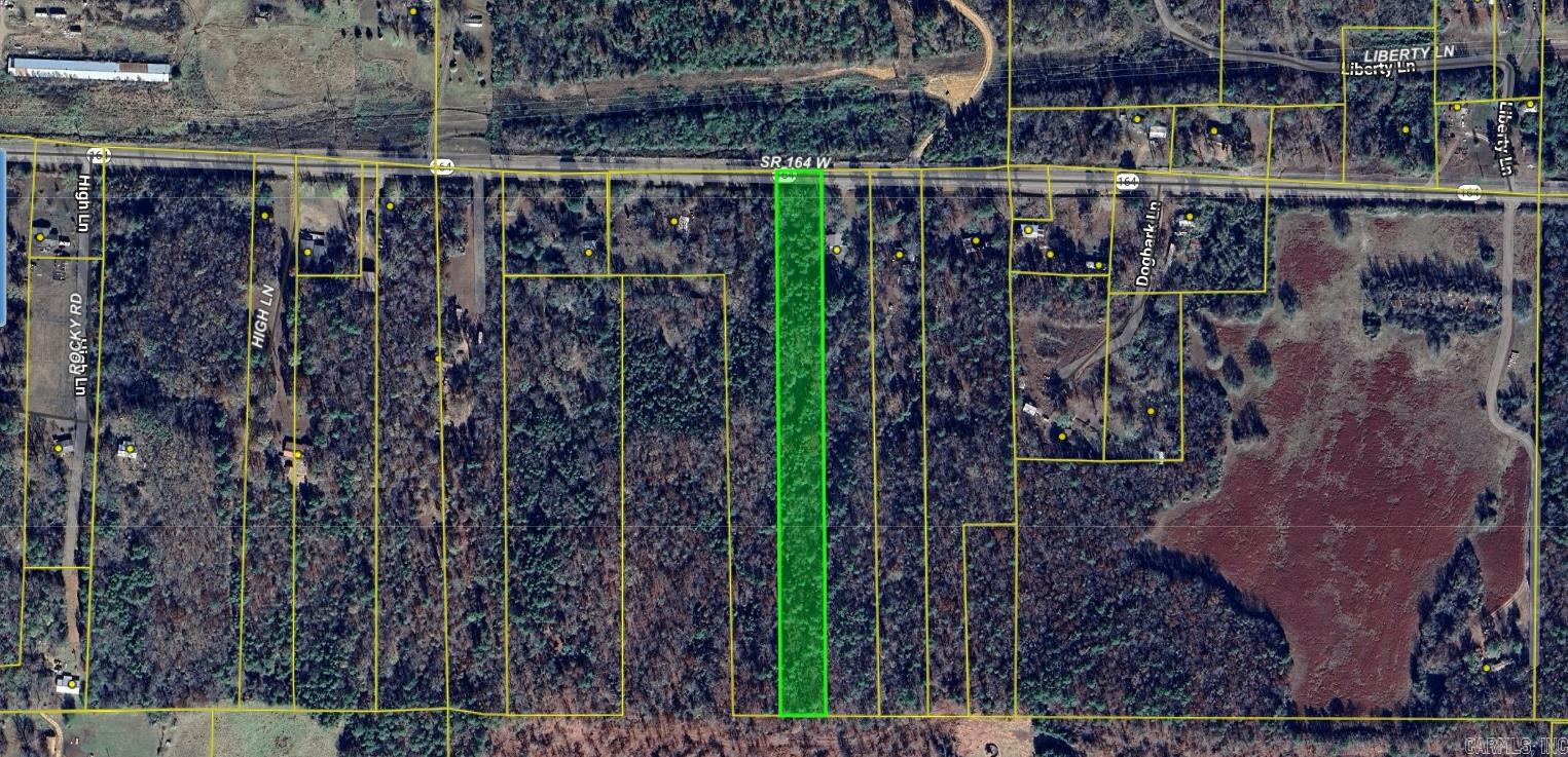 3.7 acres tract of land on Hwy 164 north west of dover near the Johnson county line