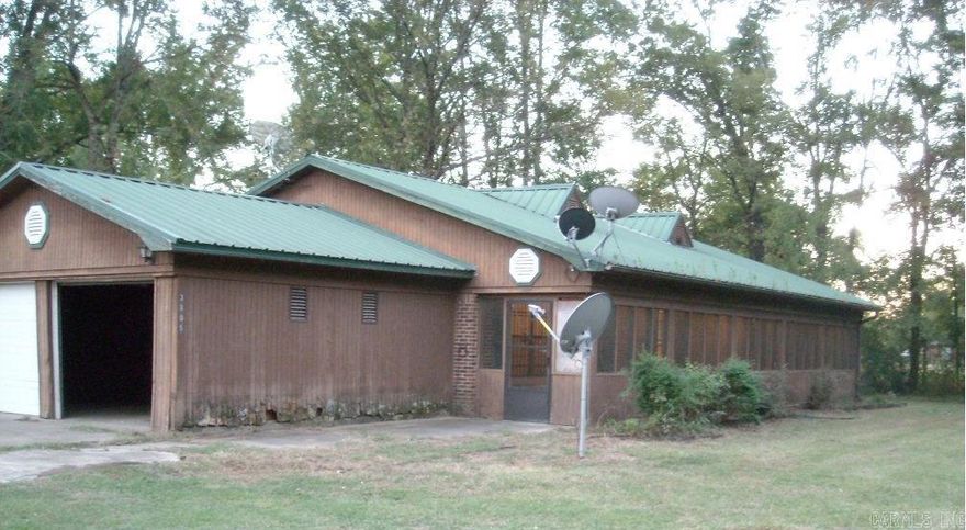 GIVE US A CALL FOR A SHOWING OF THIS COUNTRY HOME LOCATED JUST A COUPLE OF MILES FROM HOPE ARKANSAS. THIS HOME HAS 3 BEDROOMS AND 2 BATHS. THE SCREENED IN FRONT PORCH IS THE LENGTH OF THE HOME AND HAS A SWING ON THE END. THE BACK YARD IS FENCED IN AND HAS ANOTHER ACRE BEHIND THE FENCE. THE BACK 1 ACRE HAS BEEN BALED LATELY AND GOT 3 ROUND BALES OFF OF IT. IT IS GOOD GRASS FOR A HORSE OR A COW.