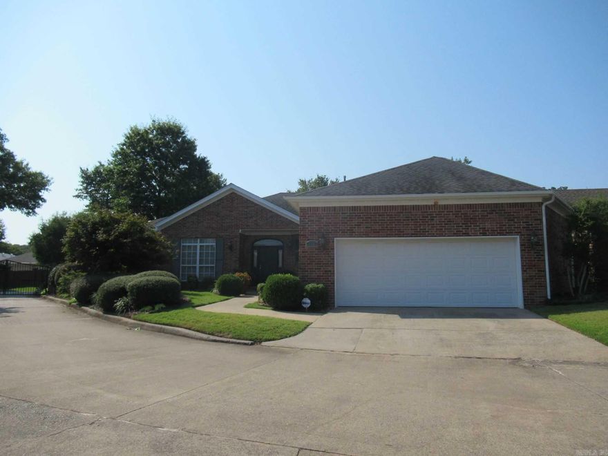 Estate property, in need of repairs and updates. 2 primary suites, 3 patios, open floor plan, hardwoods throughout, brick, very private, directly across from the clubhouse and pool, gated community, separate breakfast room, formal dining room, tons of built-ins and storage, two living rooms