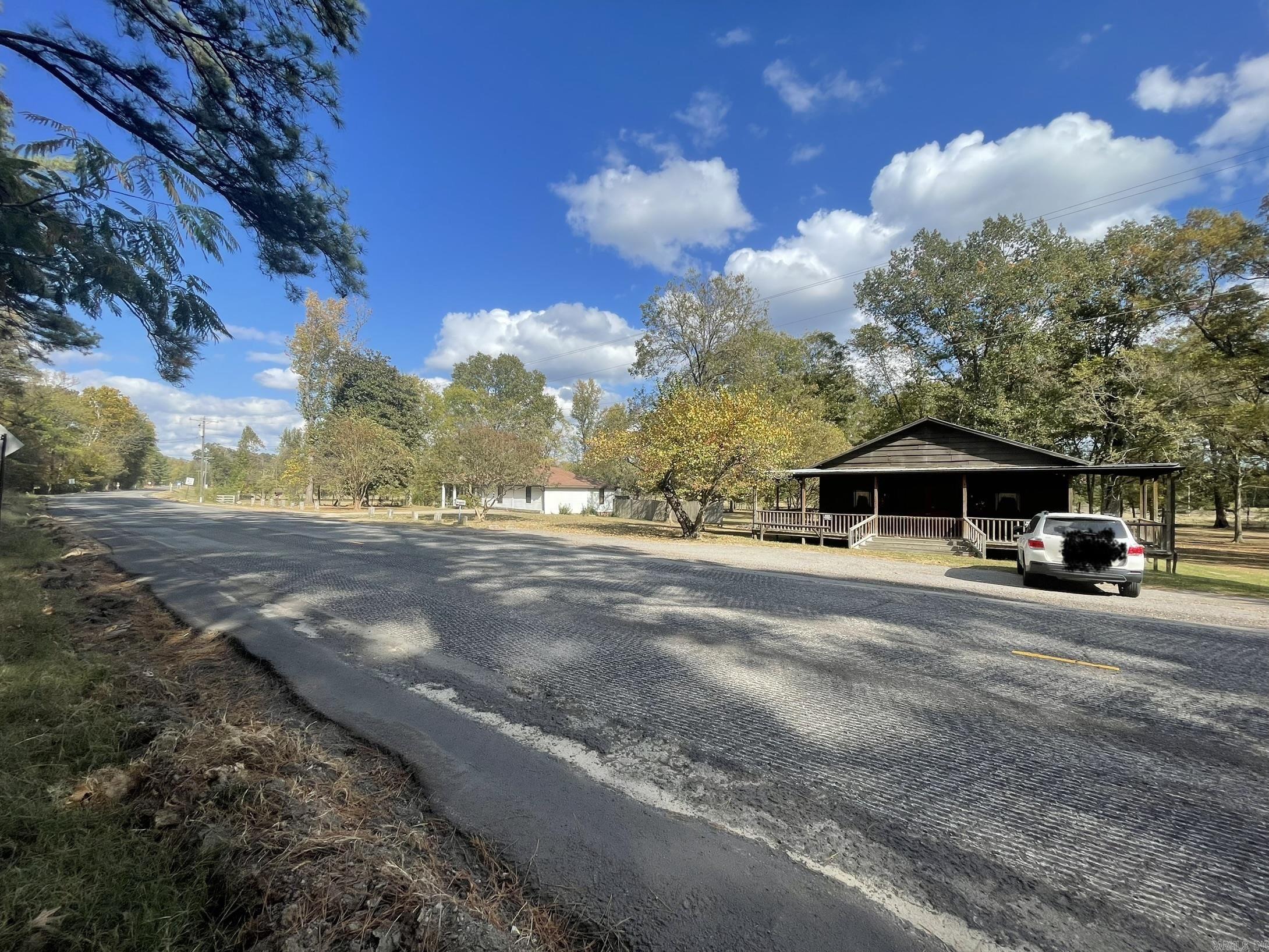 This property is in the heart of what is happening and right next door to the future Benton Buc-ee's! *** Located off of Exit 114 in Benton on Highway 229 close to the Saline River. This property is surrounded by the proposed Benton Thomas Park, Park, RV Park and Sports Complex, and other potentially large commerce coming to Benton! (Option in place but not closed.) This would be a great site for a lodge, hotel, or other commerce. This property is a short distance from the Saline River, but the river is not currently visible at the home's elevation. There is a home and a beautiful old antique store on this property. The property is not in the city limits but is surrounded by the city of Benton annexation. Home is occupied, so please set up an appointment before looking at the land.