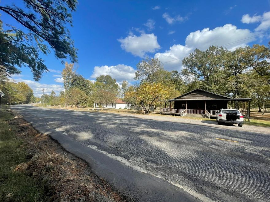 This property is in the heart of what is happening and right next door to the future Benton Buc-ee's! *** Located off of Exit 114 in Benton on Highway 229 close to the Saline River.  This property is surrounded by the proposed Benton Thomas Park, Park, RV Park and Sports Complex, and other potentially large commerce coming to Benton! (Option in place but not closed.) This would be a great site for a lodge, hotel, or other commerce. This property is a short distance from the Saline River, but the river is not currently visible at the home's elevation.   There is a home and a beautiful old antique store on this property.  The property is not in the city limits but is surrounded by the city of Benton annexation.  Home is occupied, so please set up an appointment before looking at the land.