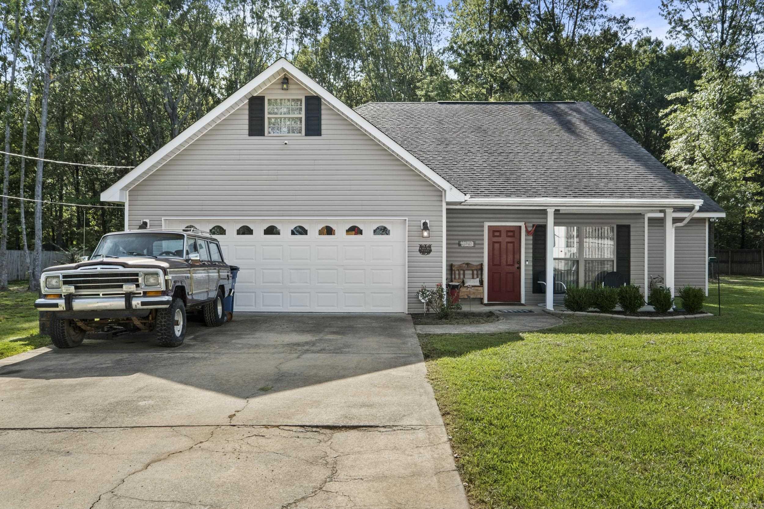 Tucked away in the heart of Beebe, this beautiful 3 bedroom, 2 bathroom home offers 2,082 sq. ft. of living space on a newly manicured 0.73-acre lot. Inside, youāll find soaring 20-foot ceilings, luxury vinyl plank flooring, granite countertops, and spacious bathrooms. The split floor plan includes three large bedrooms with generous closets. The guest bathroom features a Jacuzzi tub/shower combo, while the master suite offers tray ceilings, a large walk-in closet, and a luxury bathroom with a huge walk-in shower. Outside, the backyard has been newly cleared and manicured, creating a peaceful country feel while still inside city limits. The home is conveniently located next to Looney Memorial Park, making it ideal for families. Additional features include a large two-car garage, private driveway, new HVAC (2023), and a current survey on file. This home is move-in ready and waiting for you!