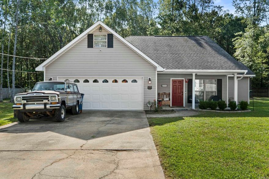 Tucked away in the heart of Beebe, this beautiful 3 bedroom, 2 bathroom home offers 2,082 sq. ft. of living space on a newly manicured 0.73-acre lot. Inside, you’ll find soaring 20-foot ceilings, luxury vinyl plank flooring, granite countertops, and spacious bathrooms. The split floor plan includes three large bedrooms with generous closets. The guest bathroom features a Jacuzzi tub/shower combo, while the master suite offers tray ceilings, a large walk-in closet, and a luxury bathroom with a huge walk-in shower. Outside, the backyard has been newly cleared and manicured, creating a peaceful country feel while still inside city limits. The home is conveniently located next to Looney Memorial Park, making it ideal for families. Additional features include a large two-car garage, private driveway, new HVAC (2023), and a current survey on file. This home is move-in ready and waiting for you!
