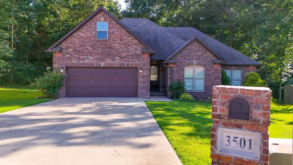 Buy the most beautiful sun porch in Jonesboro and as a bonus a beautiful all brick home comes with it! Welcome home to 3501 Burdyshaw in Sunset Hills! This custom one owner home featuring 3 bedrooms, 2 baths and a large bonus room on a large cul-de-sac lot that backs up to the woods! Enjoy privacy and convenience with great amenities included such as a fireplace, countertop gas range, and appliances included!