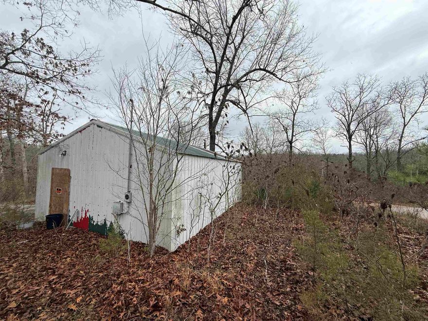 Opportunity knocks! 0.21-acre lot with a solid 30x20 masonry shop (600 sq ft) on an elevated slab. Bring your tools and vision—this handyman special could become the perfect workshop, business space, or investment. There is a house across the road that is available with this shop if desired.