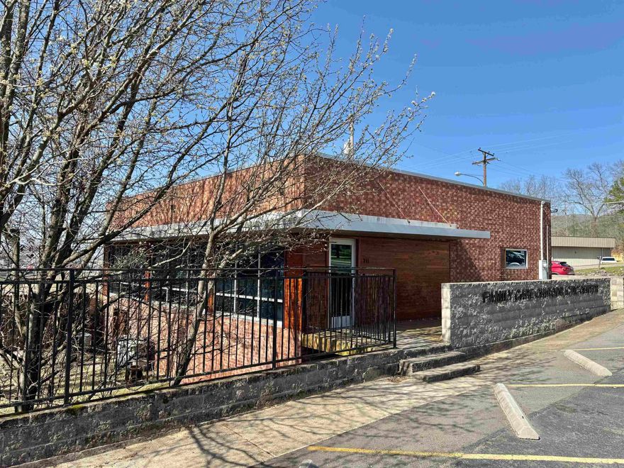Well established Chiropractic Clinic in the heart of Hot Springs. High traffic visibility with over 23,000 car per day. Large lobby, bathroom, kitchen area, separate shower, 5 patient rooms, 12 parking spots and separate entry and exit. Basement extends throughout the entire building with a fully fenced yard for extra privacy.