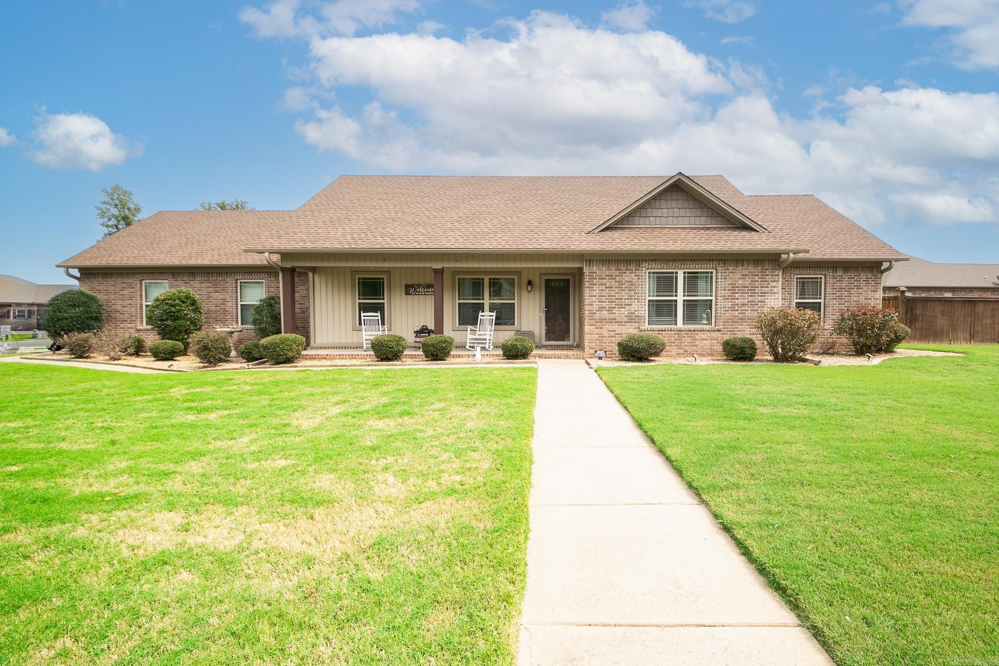 Like NEW brick home constructed in 2013 and with all the extras. Hand scraped hard wood floors. The kitchen has granite counter tops, tons of cabinets, island, and counter space. Living room is big with a Gas fireplace. Large Master suite with pan ceiling. Closet has a nice dresser. Master bath has double vanities, jetted tub, and walk in shower. Lots of storage, floored attic, covered patio, great fire pit and fenced in yard. Custom Landscaping. This is a good one! Don't miss it.