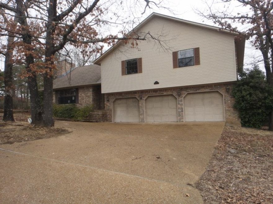 Beautiful subdivision, walking distance to lake. Corner lot. Spacious home with Family Rm, FP, vaulted ceilings, hardwood floors. Master has private balcony, double closets, jacuzzi tub, separate shower. 3 Car garage w/heated/cooled workshop area. Make this house your home.  “This property is lender owned, is being sold "as-is" and that U.S. Bank is making no representations or warranties. “See Agent Remarks