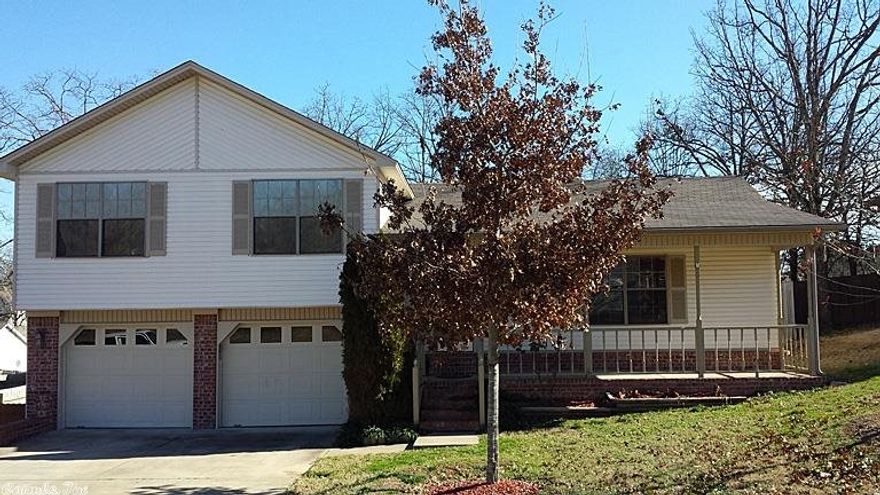 I'm lovin' this split level! This home is immaculate! Corner gas fireplace, vaulted ceilings, fresh paint throughout. New HVAC. The master bedroom is upstairs with it's own private bath and large walk in closet. The two additional bedrooms are spacious. The back deck has been redone and overlooks the fenced back yard. There is even storage in the 2 car garage. A really nice home! Call for a private showing.