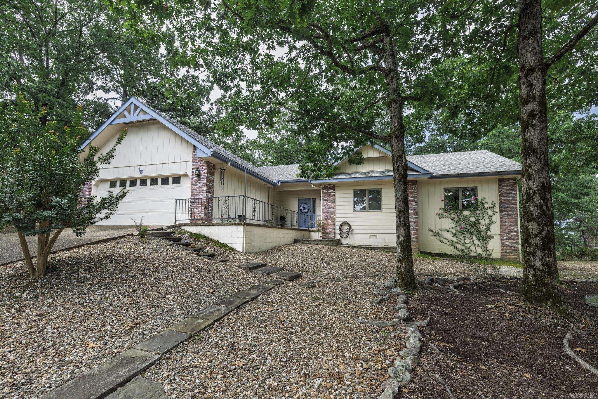 Convenient location near DeSoto Blvd and all the amenities outside HSV west gate. 3 bed, 2 bath, open den & dining, kitchen & sunroom, patio, 2-car garage w extra drive on west side of house, large lot. Exceptionally clean with lots of storage. generator hook-up. refrigerator conveys. HVAC 2021. water heater 2023. YOU CAN LIVE THE DREAM in ARKANSAS --- the Natural State. HSV is America’s largest gated community covering 26,000 acres w over 500 miles of paved streets. There are nine golf courses, thirty miles of walking trails & eleven lakes for fishing, boating & kayaking. HSV is located 15 miles from Hot Springs National Park & Oaklawn Racing Casino Resort. Clinton National Airport is 50 miles away. Amenities include 11 lakes and 9 golf courses, 30+ miles of walking trails, a fitness center, 2 beaches, 2 marinas, 2 pools (one indoor and 1 outdoor), 24 churches, clubs and activities, a performing arts center, tennis, pickleball, miniature golf, an archery range, bocce ball, a dog park and much more! You may choose the activities you desire. Be as involved as you want.