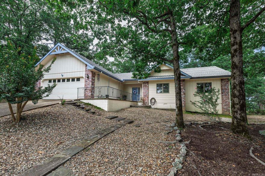 Convenient location near DeSoto Blvd and all the amenities outside HSV west gate.  3 bed, 2 bath, open den & dining, kitchen & sunroom, patio, 2-car garage w extra drive on west side of house, large lot. Exceptionally clean with lots of storage. generator hook-up. refrigerator conveys. HVAC 2021. water heater 2023.   YOU CAN LIVE THE DREAM in ARKANSAS --- the Natural State.  HSV is America’s largest gated community covering 26,000 acres w over 500 miles of paved streets. There are nine golf courses, thirty miles of walking trails & eleven lakes for fishing, boating & kayaking.  HSV is located 15 miles from Hot Springs National Park & Oaklawn Racing Casino Resort. Clinton National Airport is 50 miles away.  Amenities include 11 lakes and 9 golf courses, 30+ miles of walking trails, a fitness center, 2 beaches, 2 marinas, 2 pools (one indoor and 1 outdoor), 24 churches, clubs and activities, a performing arts center, tennis, pickleball, miniature golf, an archery range, bocce ball, a dog park and much more! You may choose the activities you desire.  Be as involved as you want.