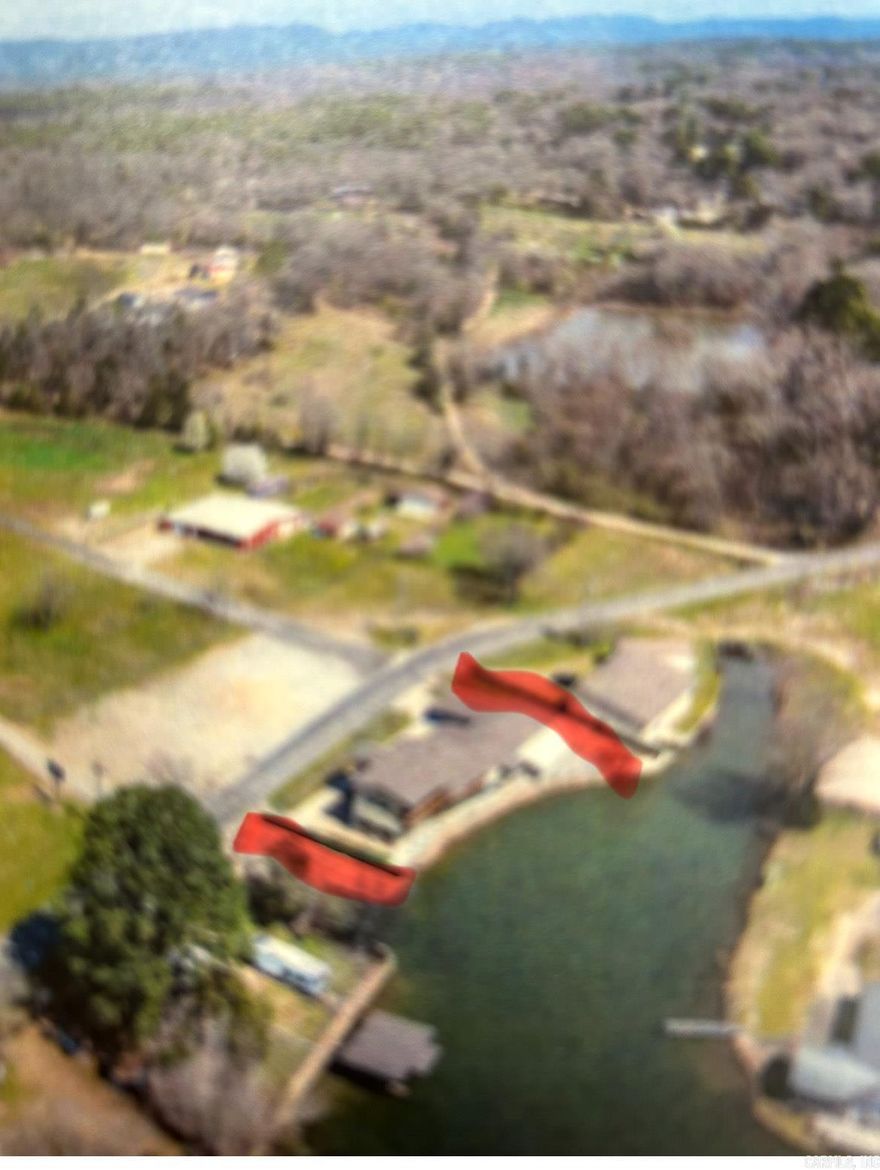 LAKE HAMILTON WATERFRONT...133 TREASURE ISLE ROAD, HOT SPRINGS, AR... 4,648 sf Home...2,160 sf Shop (easily converted to another dwelling)...PLUS RV Garage...BUY ALL OR PART (Buyer's Agents see AGENT REMARKS).  ideal for a nightly rental, family retreat or commercial development (Great Highway Exposure). Main House 4 Bedrooms (2) Master Suites.  4.5 Baths.  SEE DETAILED SPECS IN THE LAST (2) PHOTOS.  Owner may consider short-term financing.