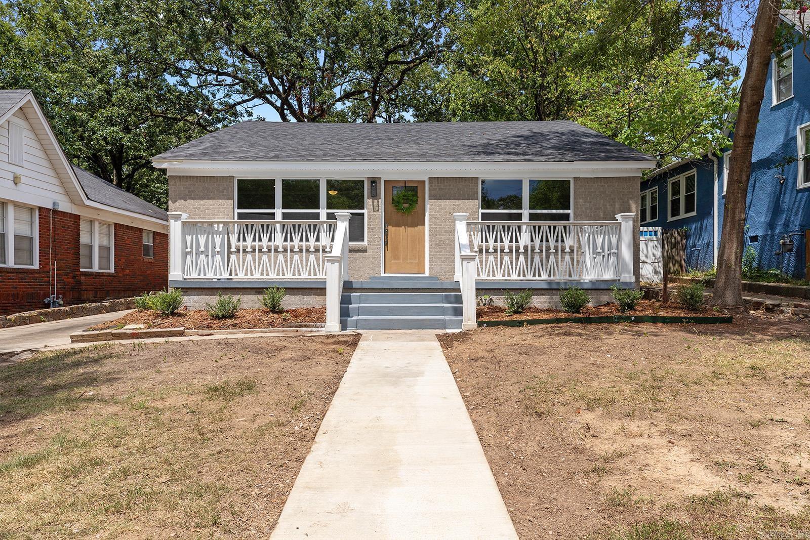 Step back in time with modern luxury in this fully renovated bungalow. Enjoy a new roof, paint, flooring, cabinets, quartz countertops, AC, fixtures, and lighting. Relax on the front porch and entertain in the secluded fenced backyard. Plenty of parking, with large enough pad space for multi cars, boat or rv! Two entrances to park from. A spacious laundry room, offers extra storage area. Schedule a private showing today and come visit your next HOME.