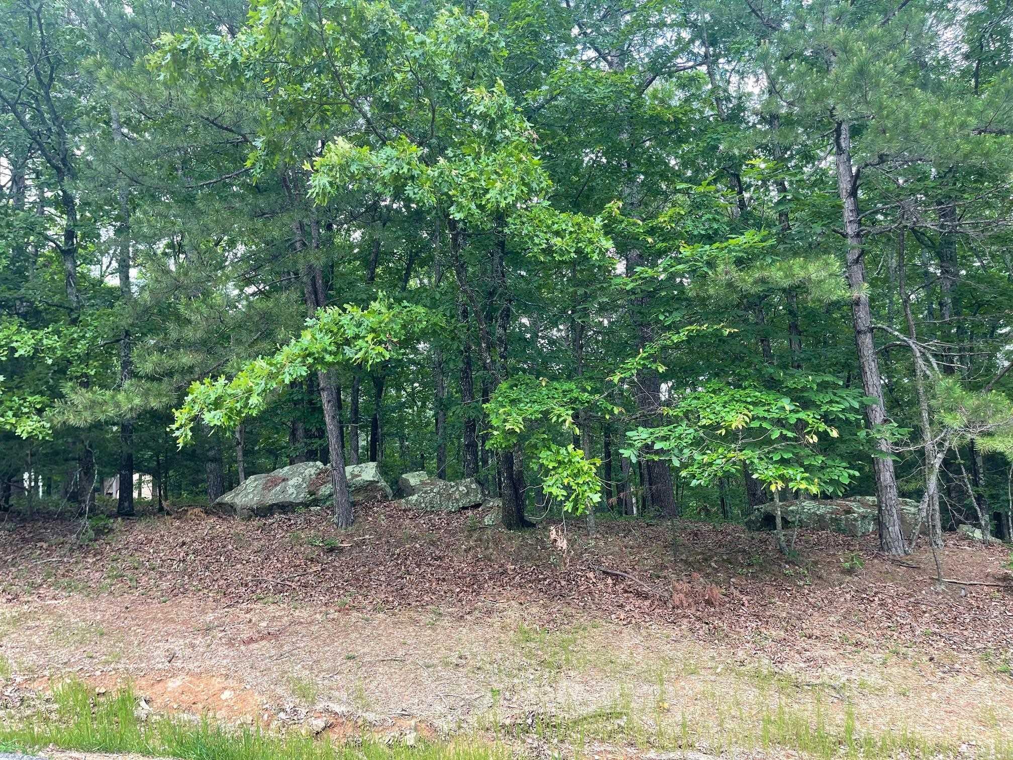 Welcome to your own slice of paradise in beautiful Fairfield Bay, Arkansas! This spacious triple lot offers the perfect opportunity to build your dream home in one of the most desirable locations in the state, with access to a wealth of amenities. Just minutes away from stunning Greers Ferry Lake. Whether you're an avid fisherman, boater, or simply enjoy relaxing by the water, this location has something for everyone. But that's not all Fairfield Bay also offers a wide range of amenities to its residents, including 3 swimming pools, 2 18-hole golf courses, hiking and biking trails, ATV/UTV trails, pickleball and tennis courts, and a full-service marina. Whether you're looking for outdoor adventure, a friendly game of tennis, or a relaxing day by the pool, Fairfield Bay has you covered. The lot itself is generously sized and offers plenty of room for your custom-built home, as well as any additional amenities you desire. With easy access to utilities and services, including water, sewer, and electricity, you'll have everything you need to make your dream a reality. Buyer to pay all closing costs and title insurance.