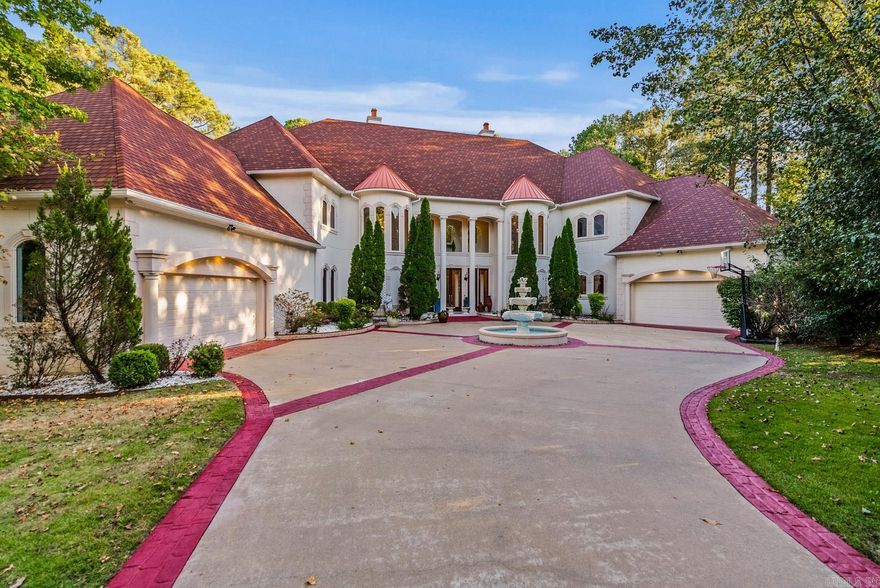 Majestic estate located in the beautiful neighborhood of Chenal Valley. Fabulous golf course on three sides including lake view, which provides the ultimate private setting on one of the largest lots in Sologne. Custom built one owner.  Gorgeous architecture: floor plan offers exceptional family living and unparalleled entertaining. Expansive living and banquet dining with 14 ft ceilings on main level with marble flrs, Gourmet kitchen and breakfast with limestone flrs, and spacious family room with tall floor to ceiling windows for abundant natural light and maximizing the views from every room. Exquisite primary suite w/hardwds on the main level.  Additional four large bedrooms with 4.5. Large office or study. Upstairs theatre and game room and open entertaining with 12 ft ceilings and access to balcony with panoramic views. Garden/Greenhouse room overlooking lush landscape with gardens and pond w/ waterfall feature with inviting pool and over 2500 sf of outdoor terrace living space. Four car garage. Gated subdivision. Truly a spectacular one of its kind stunning home and a very special place to call home!