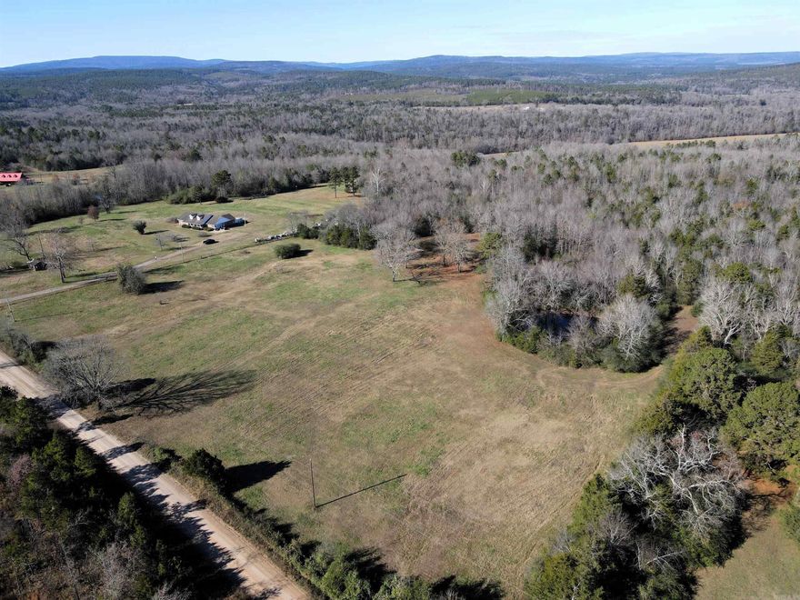 34 +/- acres of timber 10 +/- acres of pasture County road frontage Mature hardwood mix Heavy-mast-producing trees Build site with utilities and septic Great topography Year-round creek Beautiful rock formations Incredible hunting Seasonal waterfall 23 miles to Clinton 21 miles to Morrilton
