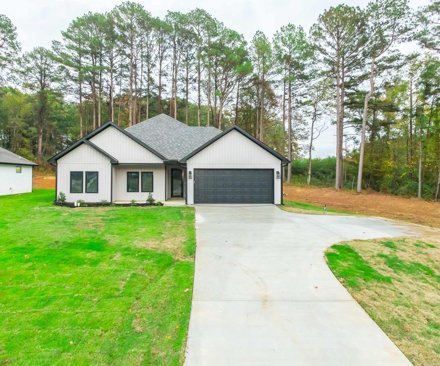 New Construction four-bedroom home sitting on a beautiful one-acre lot located in the Sorrell Road area of Benton. The open floor plan and design of this home will appeal to owners with discriminating taste and would be great for entertaining family and friends.  The beautiful casement windows bring in natural light. Enjoy your summers outside on a covered patio or winters having a nice fireside chat with guests. The kitchen has beautiful granite countertops, a very spacious granite island and stainless-steel appliances. In the master suite you have his and her vanities. walk-in shower..