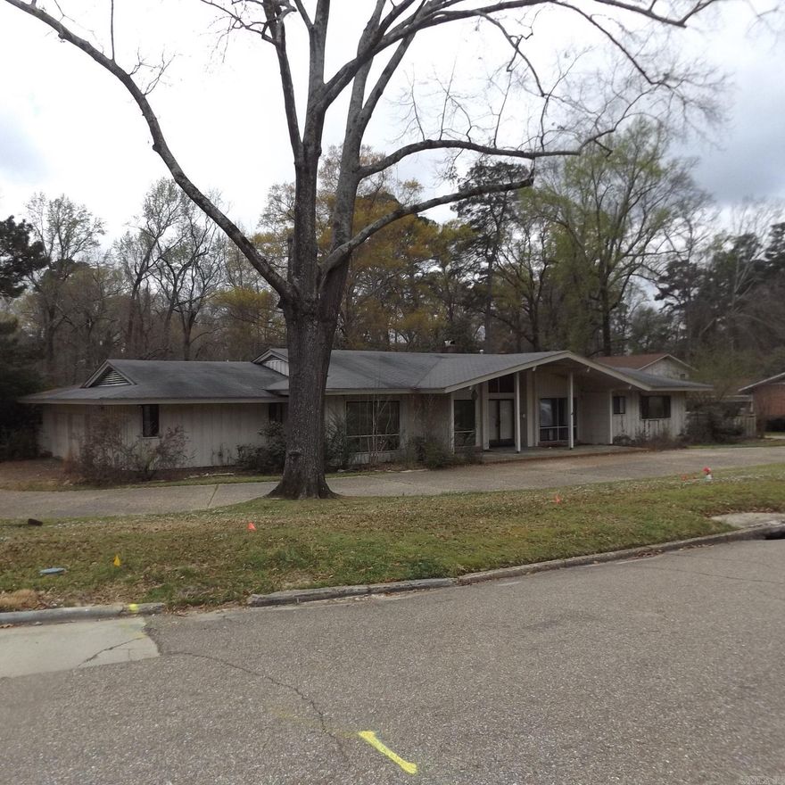 Give us a call for a showing on this huge home located in the Country Club Colony Addition. This home has 2 living areas, large kitchen and dining room overlooking the large den.