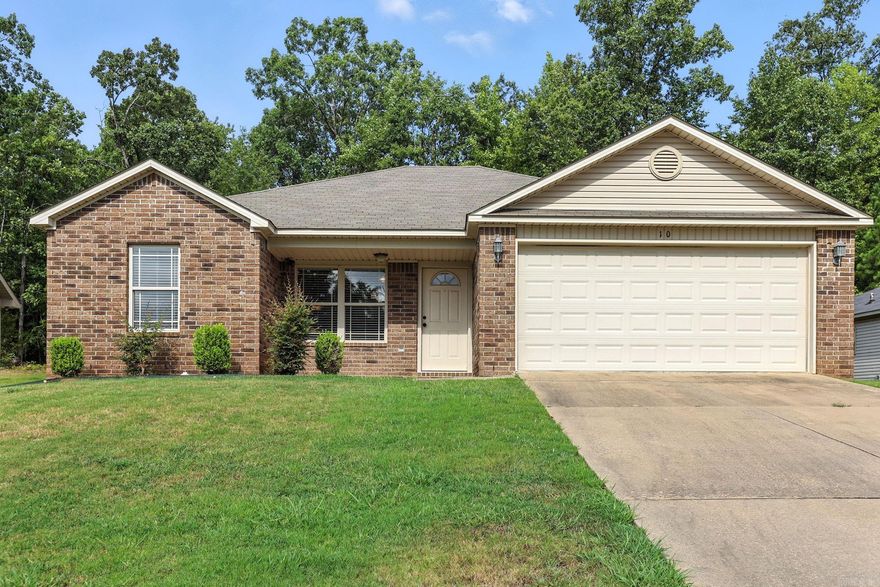 Charming and well-kept home with a smart layout that maximizes space, this home offers both comfort and functionality.  Step inside to find a warm living area that flows seamlessly into the kitchen and dining space. The primary suite includes its own private bath, while two additional bedrooms provide flexibility for guests, an office, or a hobby room. Outside, you’ll enjoy a spacious yard with plenty of room for entertaining, gardening, or relaxing evenings. Conveniently located near local schools, shopping, and quick access to city amenities, this home combines peaceful living with everyday convenience.