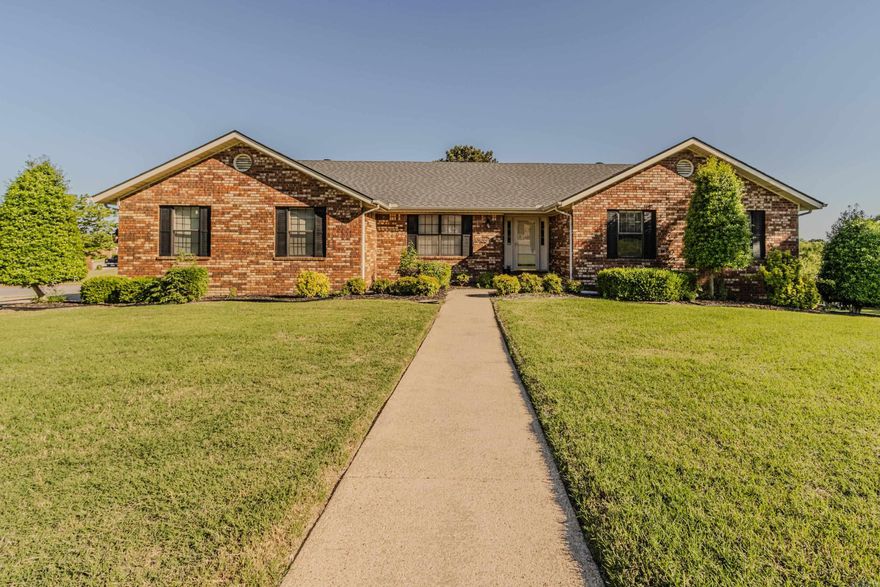 Situated on a spacious corner lot in an established subdivision, this all-brick home offers generous living space, functional design, and endless versatility. The main level features a formal dining room and an inviting open living area complete with a brick fireplace and custom built-ins. The updated kitchen is equipped with double ovens, ample cabinetry, and a convenient dry bar — ideal for entertaining and everyday living. Upstairs, you’ll find 3 bedrooms and 2.5 bathrooms, including a comfortable primary suite. The walk-out basement expands the home’s possibilities with additional living space, a bonus area, abundant storage, and a full bathroom, making it perfect for a media room, guest quarters, home office, or recreation space. A standout feature is the impressive 760-square-foot shop with garage door entry, offering incredible flexibility for hobbies, projects, storage, or workspace needs. Enjoy outdoor living from the deck overlooking the property, all within a well-established neighborhood setting.