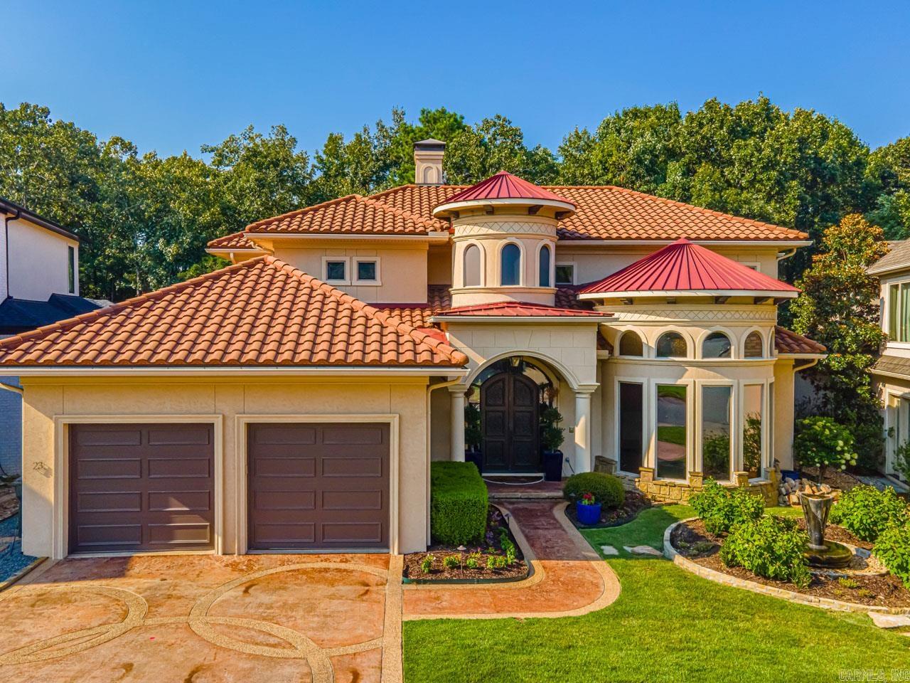 Situated behind the gates of Hickory Grove, this custom home is a haven of peace and tranquility. The home captures the essence of Italian-style grandeur. Built for entertainment, the main floor features two living areas, formal & informal dining, gourmet kitchen, home office, grand owner's suite with en-suite bath huge custom closet. Additionally, there is a powder bath & laundry. Upstairs features another living area, state of the art home theater and two-bedroom suites. The covered logia overlooking the private pool and outdoor kitchen. This fabulous home backs up to a dedicated green belt. Enjoy all the advantages of a grand single-family home in this enclave of private residences where the gate, streets, water features, common area and each home’s grounds are maintained by the homeowner's association. HOUSE IS EASY TO SHOW !!!