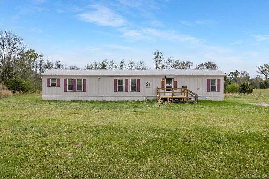 Motivated Seller!! Peaceful Country Living on 2+ Acres – Blevins, Arkansas Escape the hustle and embrace the quiet of the countryside with this well-maintained manufactured home set on 2.08 sprawling acres in beautiful Blevins, Arkansas. Tucked away in the county, this property offers the freedom and functionality you're looking for — with no city restrictions and room to live, work, and grow. The home features a thoughtfully wired generator hookup for peace of mind during storms or outages, and is surrounded by multiple outbuildings perfect for storage, livestock, or hobby use. A large shop on the property adds serious value — ideal for mechanics, tinkerers, or anyone in need of workspace. Whether you're looking for a private homestead, a base for your small business, or simply a place to enjoy the quiet life, this property checks all the boxes.