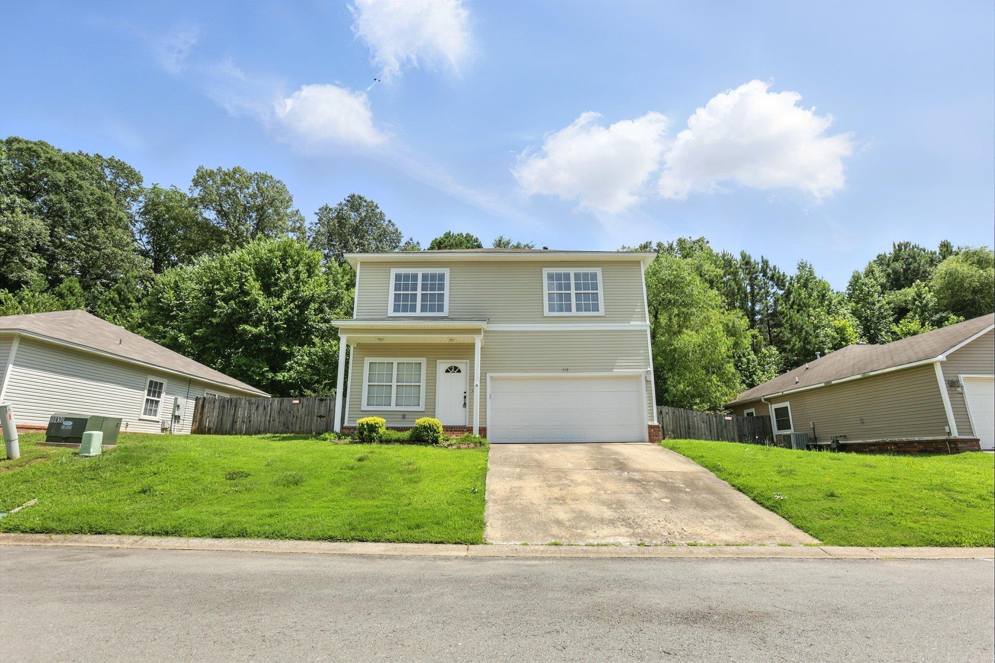 Welcome to 419 Sharon Oaks Court in Benton ā a charming two-story home combining comfort and convenience. Featuring new LVP flooring downstairs and plush carpet upstairs, this home offers a fresh, inviting feel throughout. The layout includes a spacious primary suite with a large walk-in closet, plus a Jack-and-Jill bathroom connecting two upstairs bedrooms for easy living. Downstairs, youāll find a bright living area, half bath for guests, and a well-equipped kitchen with an electric range. Bathrooms feature durable tile flooring, adding both style and function. Step outside to enjoy a fenced backyard that backs up to green space, perfect for privacy, pets, or play. With a gas furnace for efficient heating and low-maintenance siding, this home is as practical as it is welcoming. Donāt miss the chance to make this Benton beauty yours!