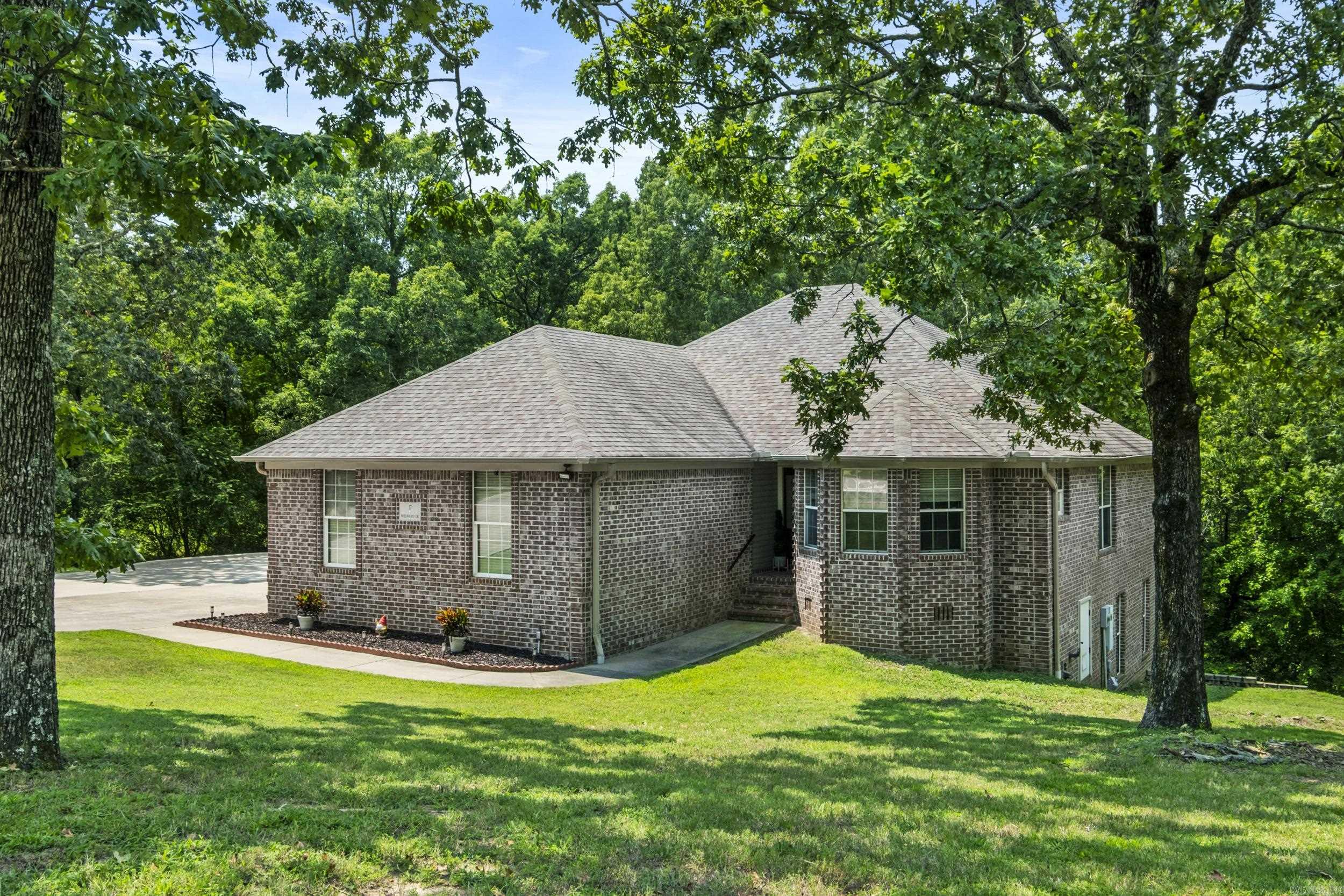 Awesome tri-level home on 1.5 acres in highly sought-after subdivision within the Cabot School District! This spacious family-designed home offers a unique layout with room to spread out and enjoy! The Main Floor features the Great Room, Kitchen, Formal Dining, Office & the Private Primary Suite complete with a Brand New Custom Walk-in Shower! Mid Level,you'll find 2 Good Sized Bedrooms & a Full Bath, while the lower level offers a Spacious Family Room, Laundry Room, & a Walk-Out Basement for easy access to the Beautiful Outdoors! Enjoy peaceful, wooded views from not one, But TWO oversized decks, offering Serene Privacy & a Perfect Spot to Unwind after a Long Day! This home is Packed Full of charm and Functionality. Recent Updates include Additional Circle Parking in 2022, Dual Speed Multi Zone HVAC in 2023, & a New Water Heater in 2024! Don't miss this Rare Find!