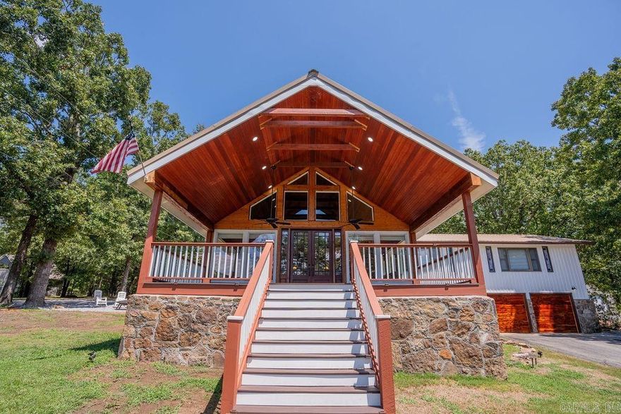 ~~~~~Owner financing available!!!~~~~~  Experience Elegant Lakefront Living at its Finest! with this fully furnished retreat boasting unparalleled panoramic views of Greers Ferry Lake—renowned as one of the cleanest and most beautiful lakes in the nation.  The showpiece of the home is the warm and inviting gathering room, where a soaring wall of windows captures sweeping views all around and a flood of natural light. From here, step through double doors onto a newly constructed covered deck, ideal for soaking in the beauty of evening sunsets, creating a serene and luxurious atmosphere year-round.  Set on 1.3 private acres, this exceptional property offers everything you need for refined lakeside living. Including a spacious barn, RV hookup, and High-speed internet available. With just a short trail walk down to the lake, enjoy endless swimming or jumping from the bluffs.  Surrounded by peace and privacy, nature lovers will appreciate the frequent visits from deer and turkey. Whether you’re searching for a permanent residence, a luxury getaway, or a turnkey vacation rental.  This is more than a home—it’s a front-row seat to one of Arkansas’s most treasured landscapes.