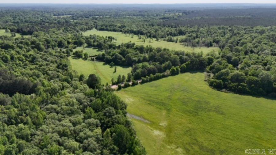 Land, Land and more Land.  Total of 229 acres located west of Mineral Springs, property has the beautiful Blue Bayou Creek running through the property, great potential for cabins along the creek.  The property can be subdivided with approx 92 acres on the west side of Bluff Springs Road and approx 137 on the east side of Bluff Springs Road.  Property has some pasture some timber and creek running through the property, this is a great investment, hunting, recreational or cattle property.  The possibilities are endless.  Contact our office for more details.