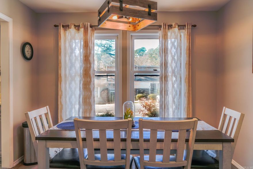 Adorable, Move in Ready - Fully furnished Townhome! This two-story townhome features 3-Bedrooms, 2-Baths and would be perfect for primary home, 2nd home, or rental. The primary suite is thoughtfully situated on the main level, ensuring ease of access and privacy. Upstairs you will find two spacious guest bedrooms and Bathroom / laundry. Additional features of this home include Luxury vinyl flooring, newer Stove, Microwave, Dishwasher, Recessed lighting, NEW ROOF May 2024, and no popcorn ceilings. Downstairs Patio is perfect for grilling and entertaining while the upstairs patio deck offers privacy with peaceful views of nature. This delightful townhome also includes dedicated parking spaces and is conveniently located near local shops, dining experiences, and recreational facilities that embrace the vibrant lifestyle unique to this community. With its prime location and exceptional features, this property presents a rare opportunity to experience comfortable living amidst picturesque surroundings. Don’t miss your chance to call this stunning townhome yours! No Seller's Property Disclosure. Being Sold "AS IS"