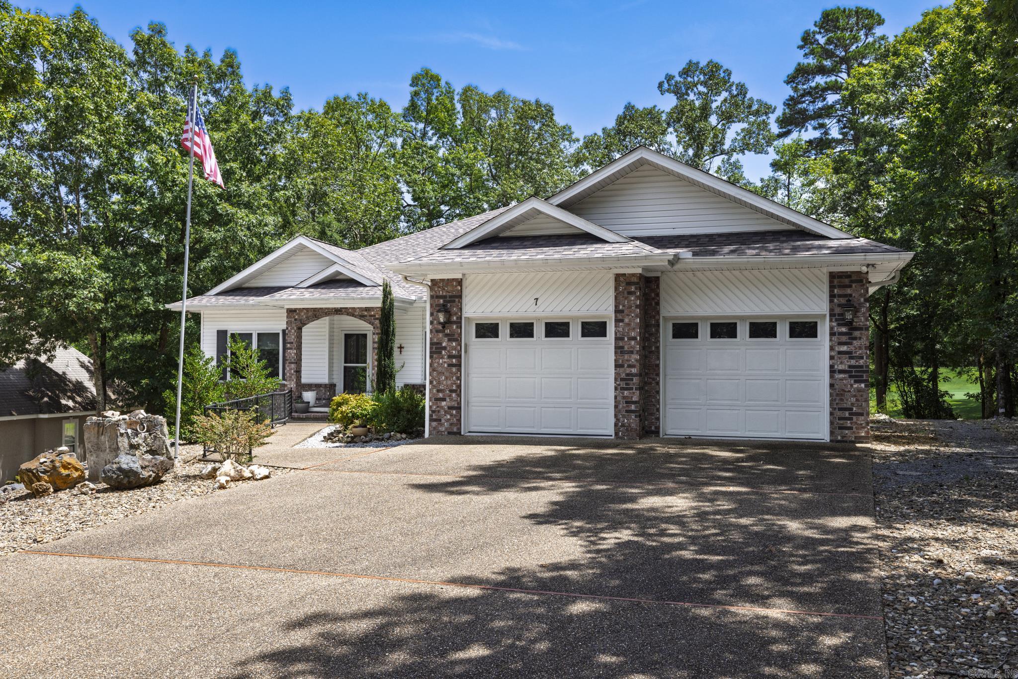 Welcome to this exceptionally well-maintained 3 bed 2.5 bath home sitting on the 14th green of Ponce de Leon Golf course. Enjoy this open concept home with vaulted ceiling. The chef will enjoy this kitchen with lots of cabinets, pull out drawers, built in oven, glass stove top, movable island with corian countertops. All appliances remain, including new microwave. The breakfast nook includes a wet bar with lots of storage. Amazing laundry room has lots of storage and sink. Owners suite includes large bedroom that opens to the Arkansas room, two walk-in closets, and a bathroom with spa tub, separate shower, private toilet, linen closet and windows to let in natural light. Split bedrooms with one of the guest rooms that open to the deck. Entertain your guests on the 48x18 foot covered deck with 3 ceiling fans. The view of the golf course is something you must see! Looking for a workshop? Check out this very spacious area in the lower level with the double door that can be used for golf cart storage. Outside the lower level is covered deck area that also has a great view of the golf course. Roof replaced 2022. New residents to HSV are subject to $2,000 POA buy-in fee.