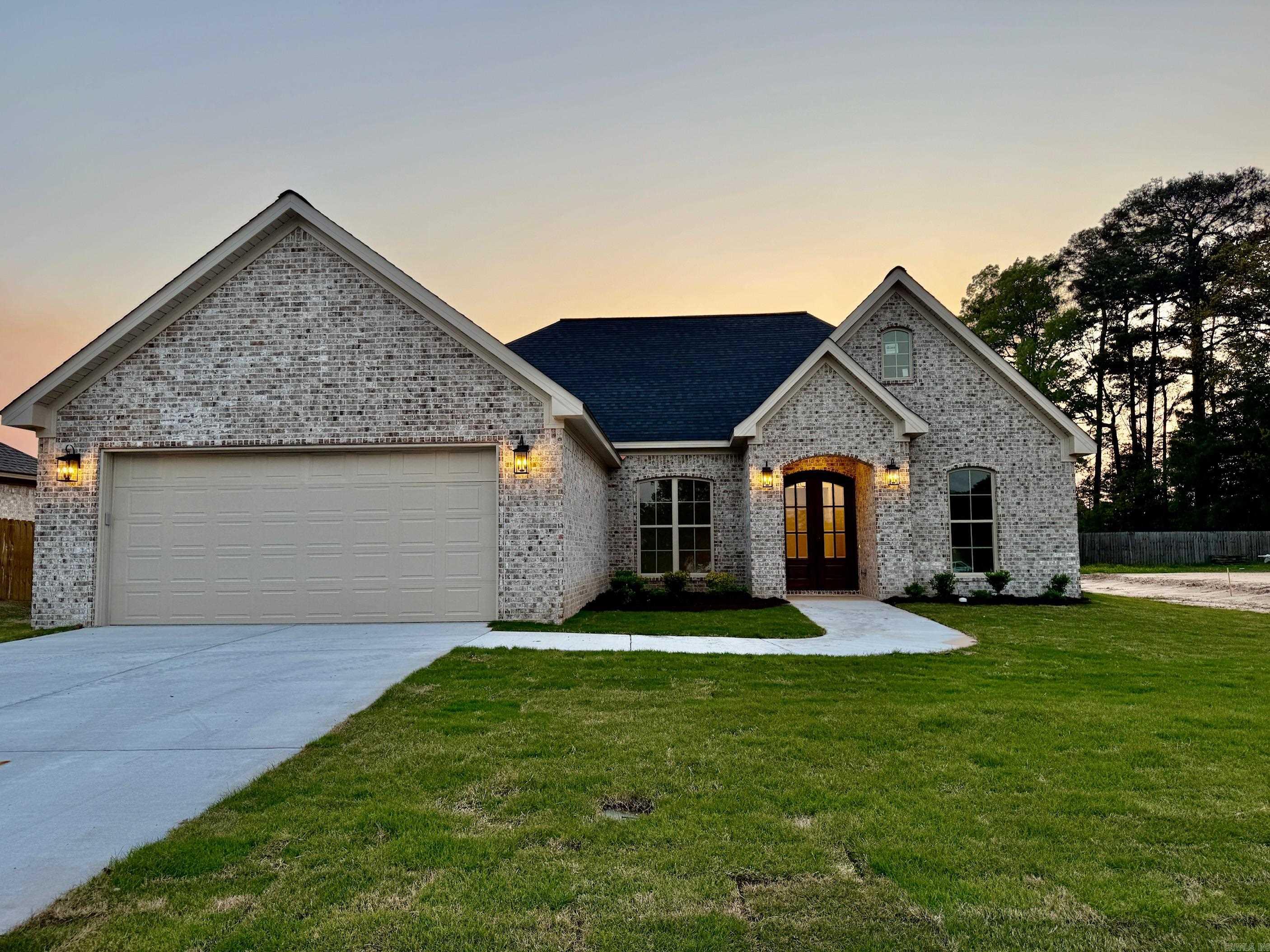 Welcome to this beautifully crafted new construction home located in a prime White Hall location! This 3-bedroom, 2-bathroom home includes a dedicated office spaceāperfect for working from home or extra flexibility. The open-concept design features luxury vinyl plank flooring throughout the main areas, granite countertops, and sleek stainless steel appliances in the kitchen. Unwind in the spacious primary suite with a custom tile shower and a relaxing soaking tub. Additional highlights include a large laundry room, fully sodded yard, and stylish finishes throughout. With modern amenities and a convenient location, this home offers the perfect blend of comfort and convenience.