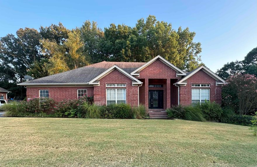 Custom built brick home located in a semi-private neighborhood with easy access to I-30 and just minutes from downtown Little Rock.  A few of the many features include original hardwood floors, double walk-in closets, tray ceilings, custom walk in shower, jetted bath, gas fireplace, and a large deck over-looking wooded area behind the home.  Property includes a 12'X16' concrete floored brick shop that is climate controlled.  Roof was replaced in 2017 and water heater was replaced in 2020 with a new tankless unit.  HVAC unit serviced and working efficiently.