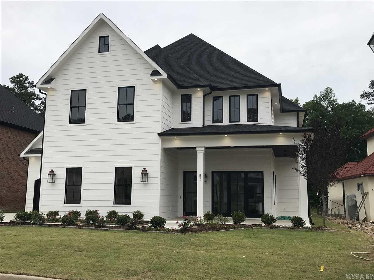 New Home on Chenal Golf Course! 2-Story GR w/21ft Marvin bi-folding patio doors w/private wooded golf course view & covered patio w/outdoor KIT... KIT w/48" range, 3 ovens, 48" built-in fridge.. Island seats 6 & is 10x5... Large master w/FP & 11ft shower w/3 heads & a 12x19  closet... Separate guest room on main level w/private bath... 2 BR's up both w/private baths + 3rd BR up makes excellent game room... 3 Car side-load garage... James Hardie Siding...HOA Dues includes yard maintenance