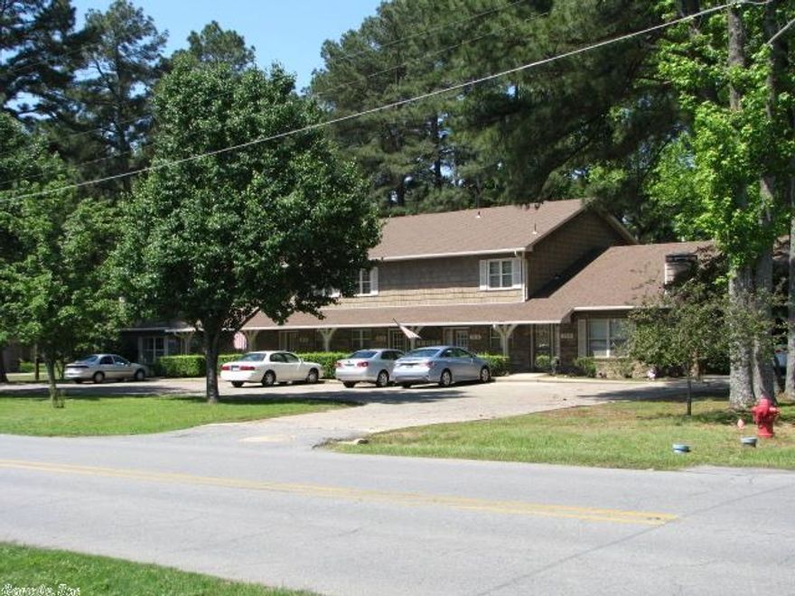 Great investment opportunity!  6 Townhouse units w/long-time residents.  5 Units have 2 bedrooms & 1.5 baths; the sixth unit has 1 bedroom & 1 bathroom.  Property has been well maintained.  Additional .42 acres available directly behind apartments; see MLS #: 10387510.